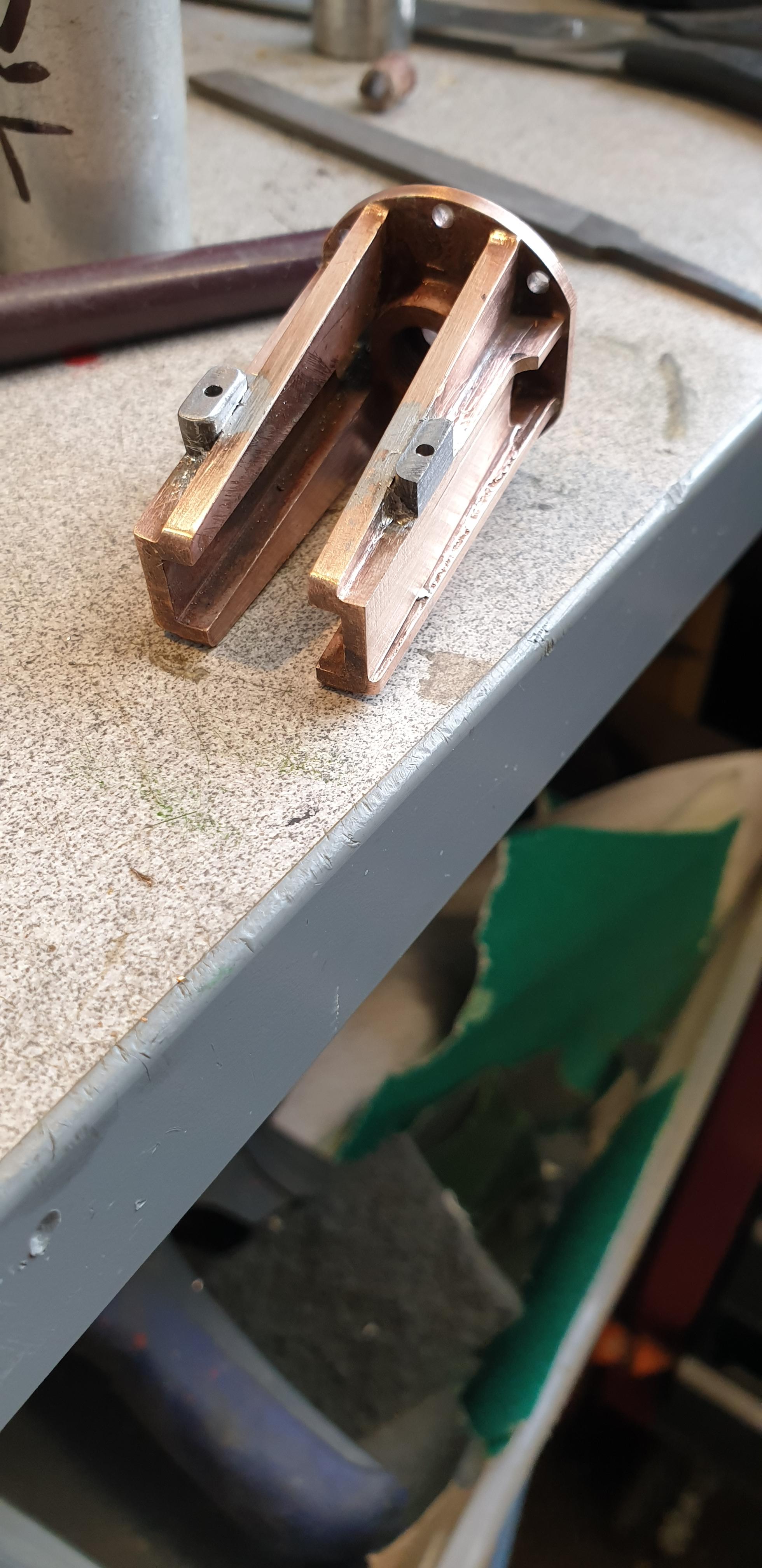 Steam-chest covers and their valve guides